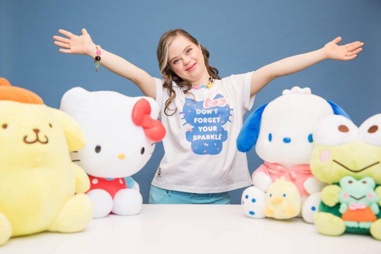 Megan Bomgaars arms wide with plush Sanrio characters