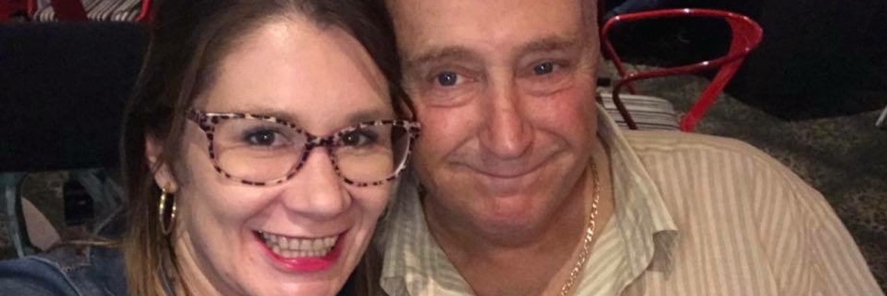 The Analogy I Use to Describe Brain Fog The writer posing with her dad for a photo.