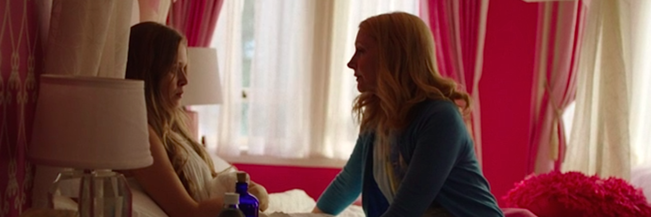 'Sharp Objects' Episode 7 Recap: 'Falling' Amma and her mom, Adora. Amma is lying in bed, and Adora sits over her