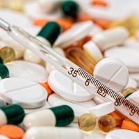 medication tablets and a syringe