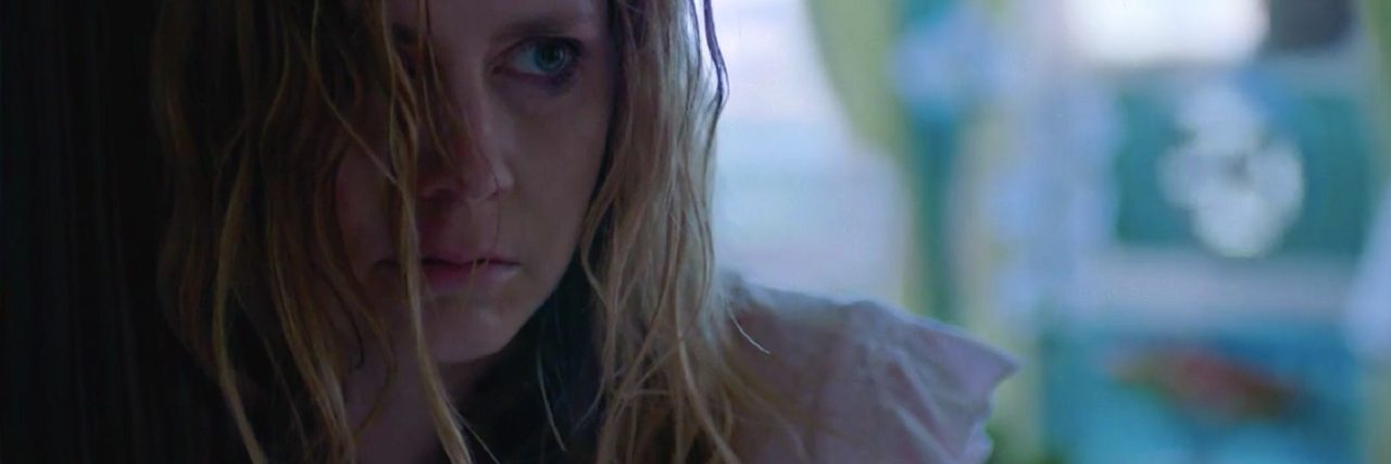 'Sharp Objects' Episode 8 Review: 'Milk' Amy Adams in Sharp Objects. Her character, Camille, is wearing a white night gown and looks sweaty and sick