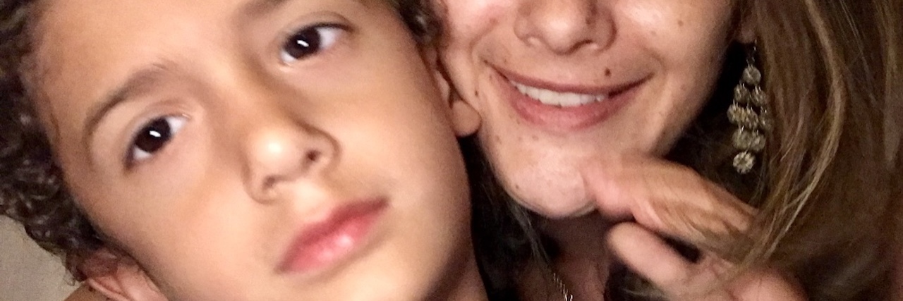 When Your Child Is Diagnosed With Autism selfie of mom and child smiling at camera