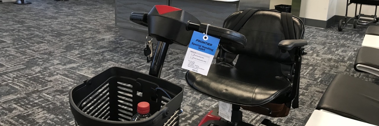 Air Travel With a Mobility Scooter Scooter with gate check tag.