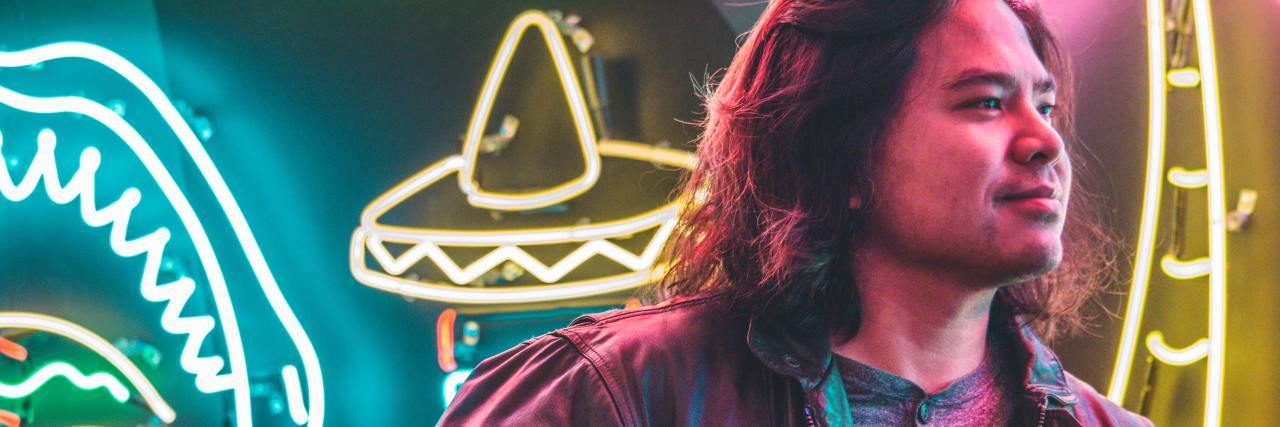 Why I'm Grateful for My 'Unstable Identity' as Someone With BPD man neon lights