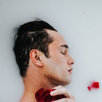 man in bath tub