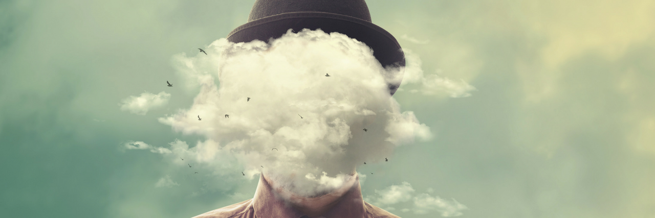 #TakeTheMaskOff Campaign Created to Encourage Autistics to 'Unmask' Man's face hidden by a cloud while wearing black hat and red button down
