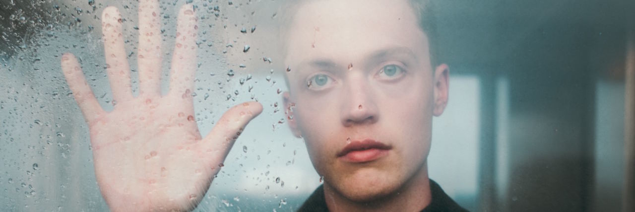 C-PTSD Repressed Childhood Memories man with hand on window