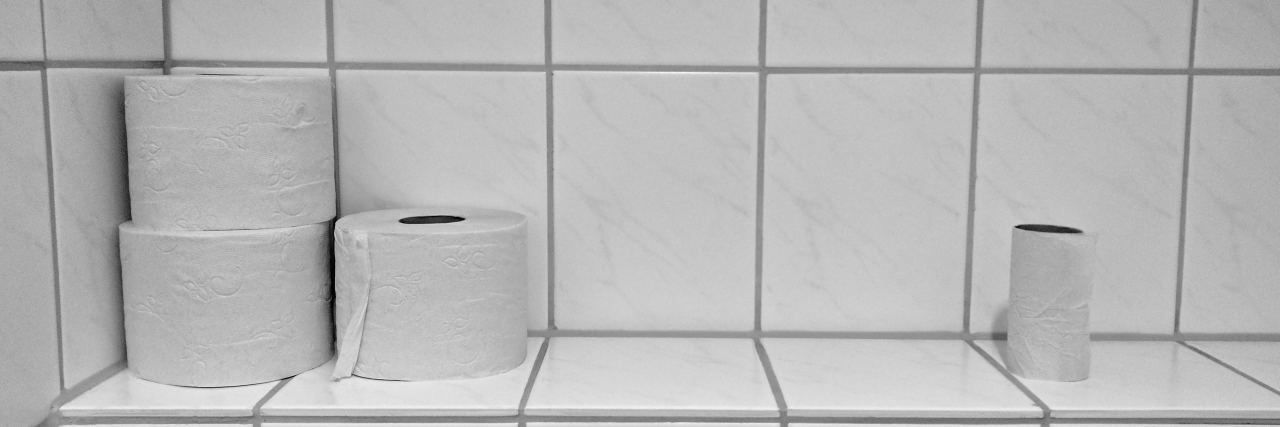 Why Talking About Poop Is Important When You Have Crohn's Disease toilet paper on a bathroom shelf