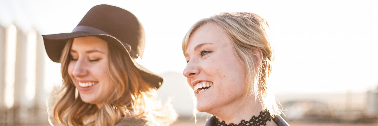 What It's Like to Be the 'Favorite Person' of Someone With BPD two friends laughing