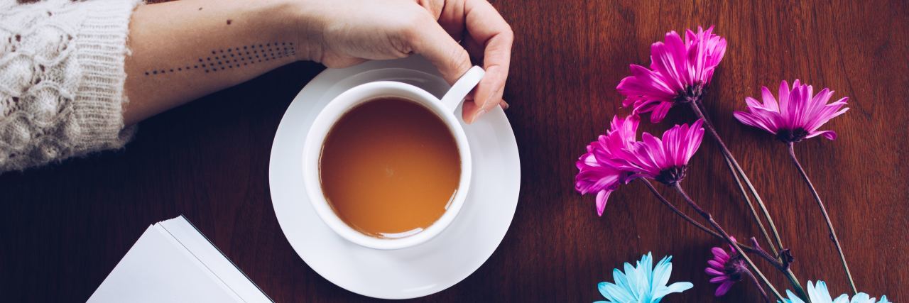 When I Realized ADHD Caused My Performance Anxiety Coffee and flowers.