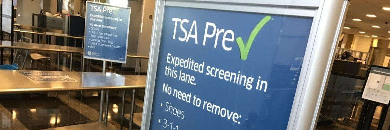 TSA airport screening checkpoint sign.