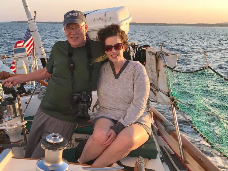 woman and man on sailboat