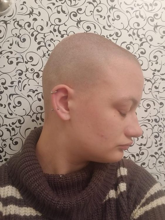 Woman with a shaved head