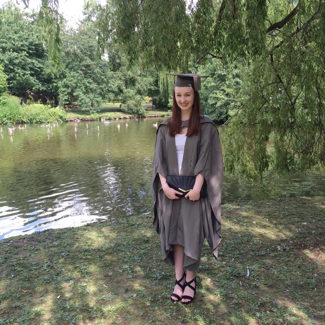 Pippa wearing graduation cap and gown