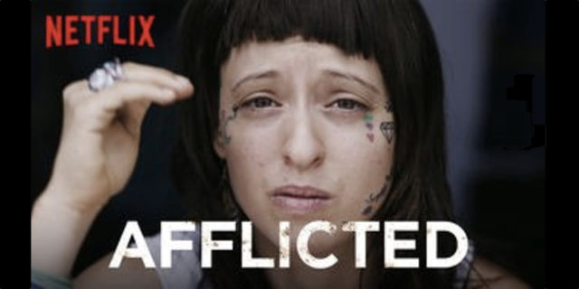 "Afflicted" promo image, shows a white woman with short black hair and bangs.