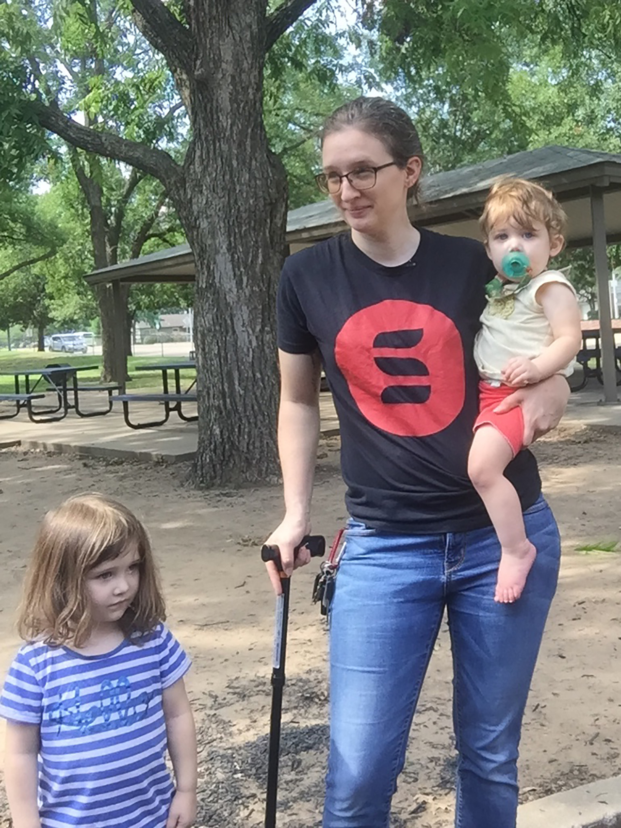 Tab Moura at the park with her children.