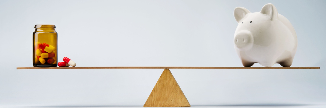 Why It's Expensive to Be Chronically Ill Piggy bank balancing on seesaw over a bottle of pills