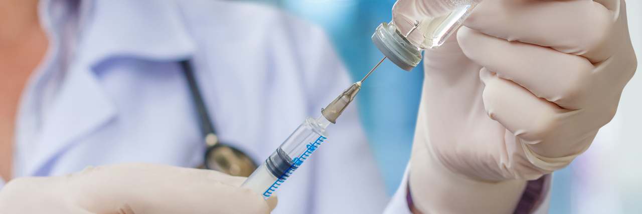 FDA Approves Clinical Trial to Test BCG for Fibromyalgia Doctor gaining in a syringe medication for injection.