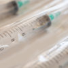 syringes in plastic wrap