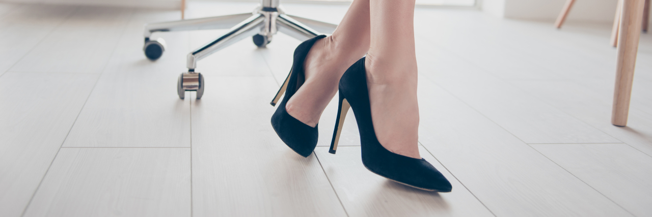 Finding Employment as a Woman With Cerebral Palsy Business woman's legs in high heels.