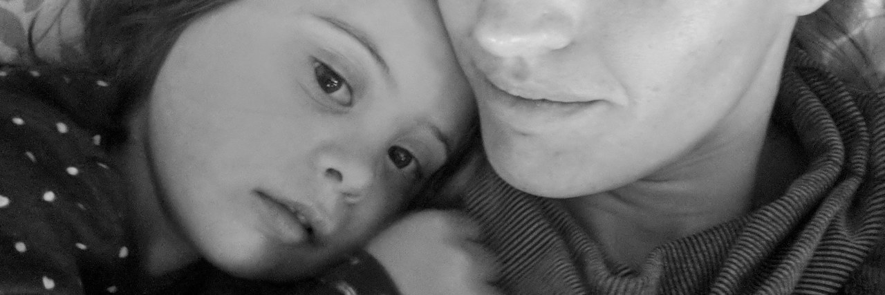 People With Down Syndrome Are Not 'Always Happy' Tessa with her daughter who has Down syndrome.