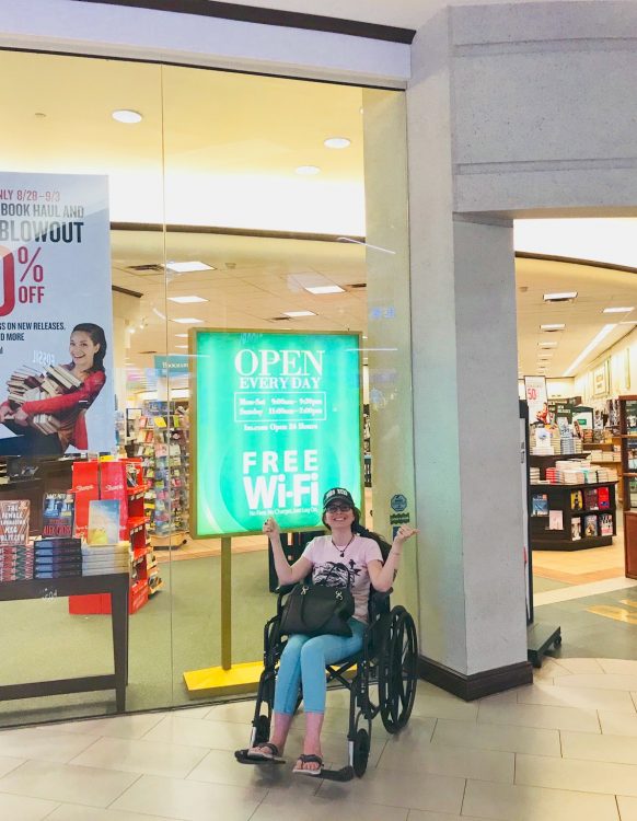 The author in her wheelchair at the airport