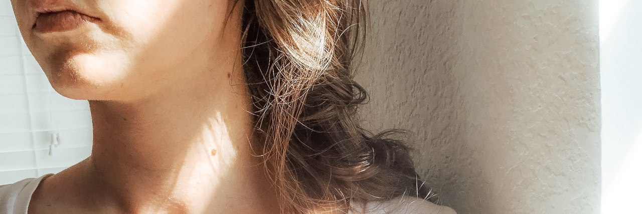 How Crohn's Disease Affected My Mental Health Woman in bathroom