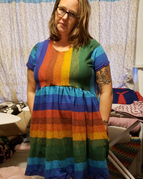 Woman in a self-made colorful dress