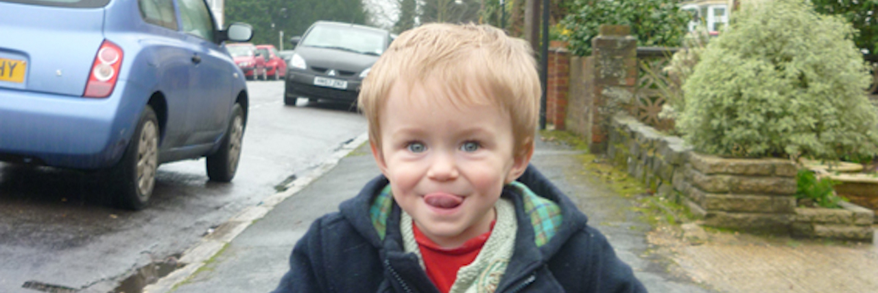 MAES Therapy for My Child With Cerebral Palsy Adorable little boy using yellow walker.