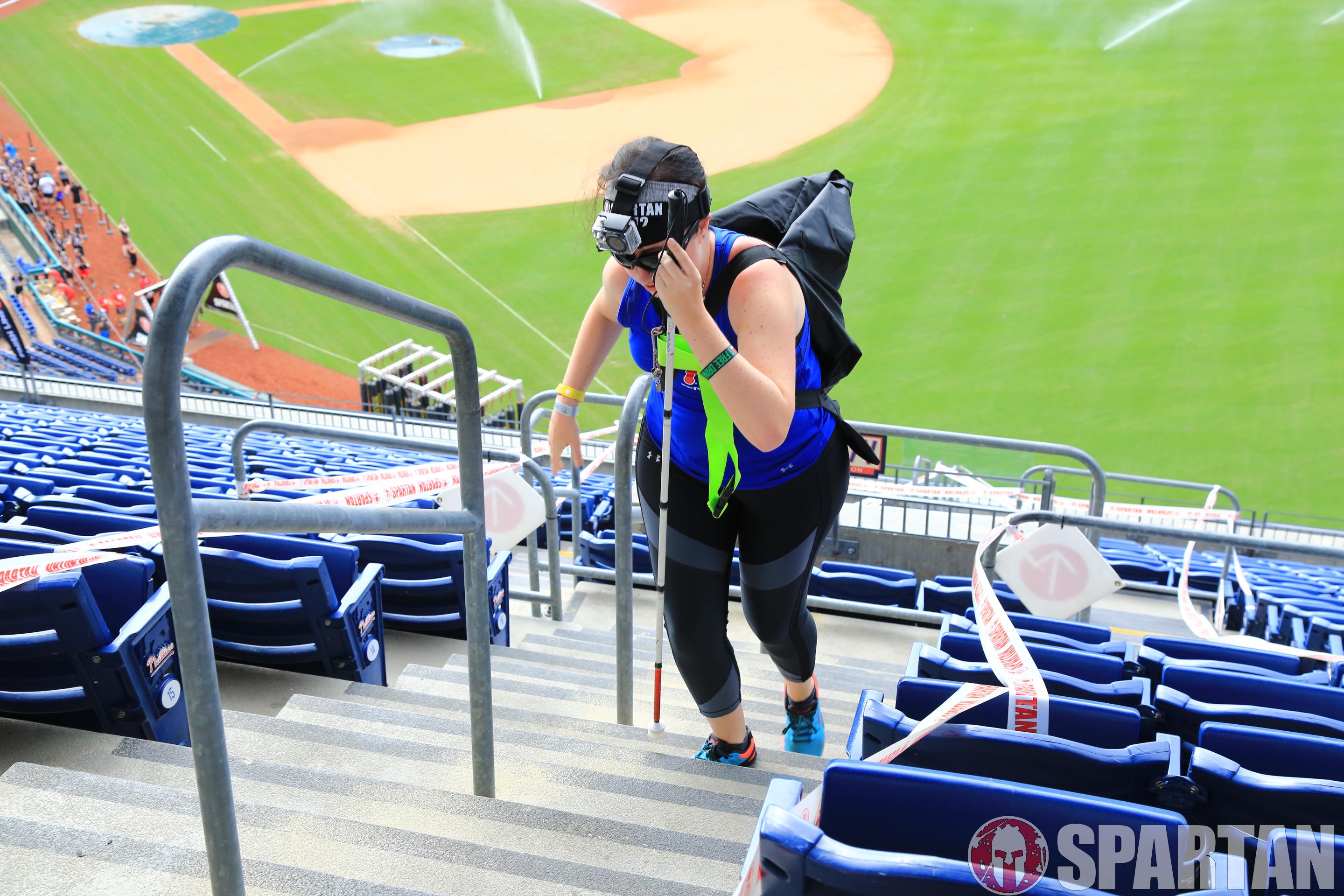 Jess competing in the Spartan at Citizens Bank Park with a modification for the sandbag carry.