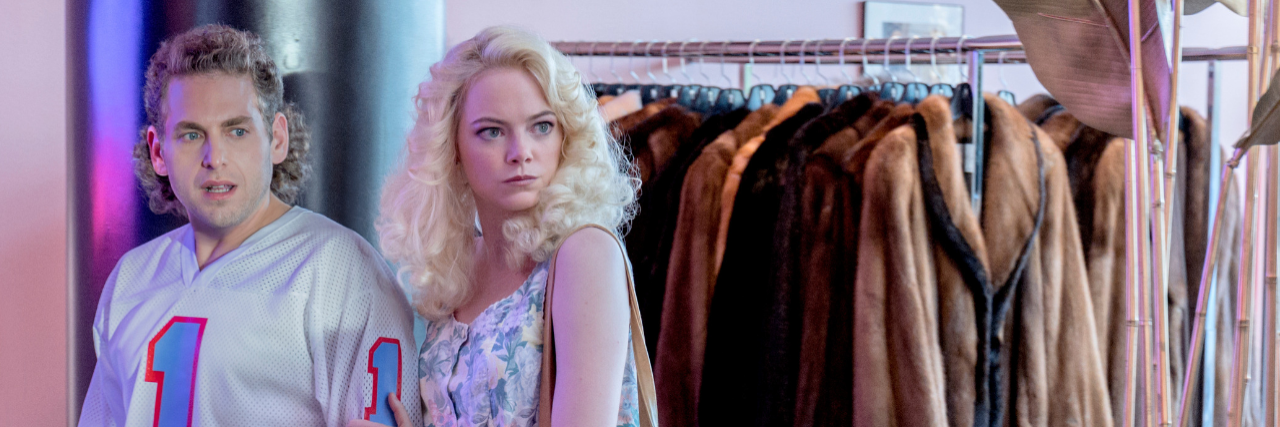 Netflix's 'Maniac' Season 1, Episode 4 and 5 Recap: 'Furs by Sebastian' and 'Exactly Like You' Still of Jonah Hill and Emma Stone in Maniac. Hill is wearing a jersey and Stone has 80s style hair curls.