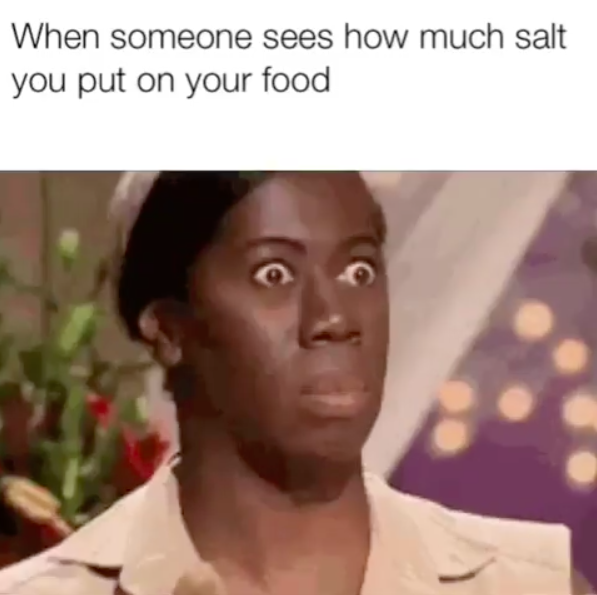 when someone sees how much salt you put on your food: woman with her eyes wide