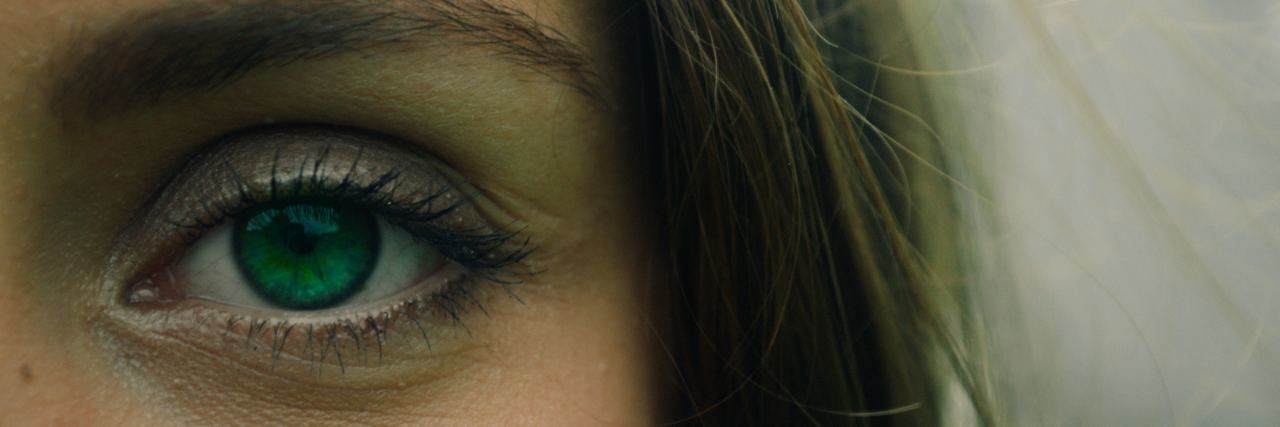 What to Know About Chronic Pain This Pain Awareness Month close-up of a woman's eye