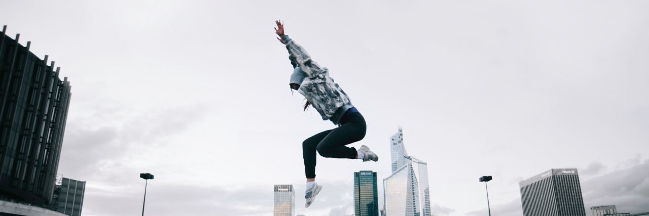 Using a Wheelchair Part Time Person jumping.