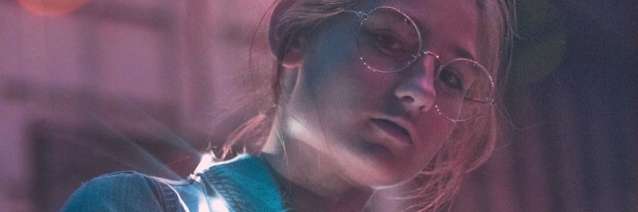 Making Meaning Out of Your Mental Illness 'Label' A woman with glasses