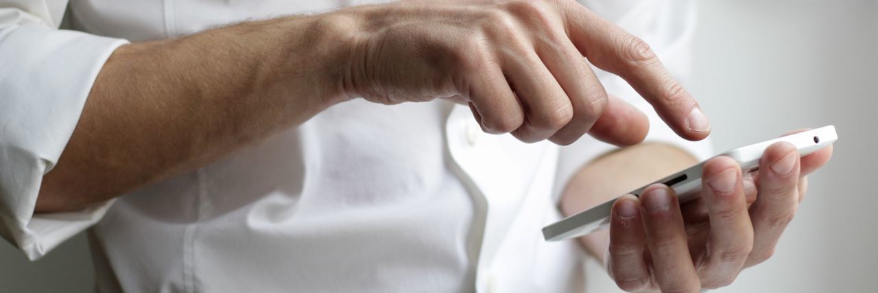 What This Psychiatrist Thinks You Need to Hear man in white shirt with phone