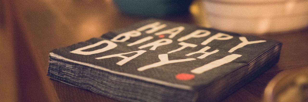 What It Was Like Turning 21 With Ehlers-Danlos Syndrome birthday napkins on table