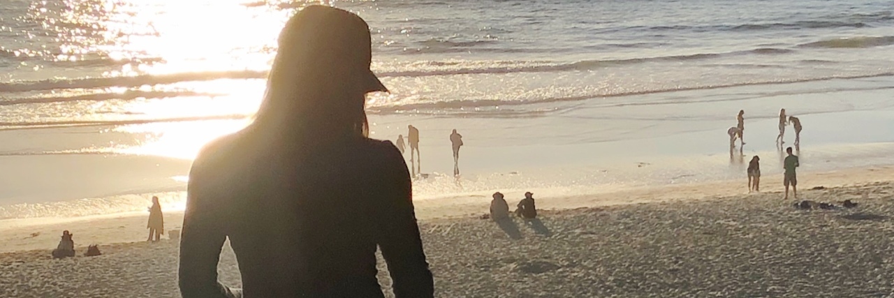 What Living With Pain Caused by My Lupus Taught Me Girl and dogs on beach