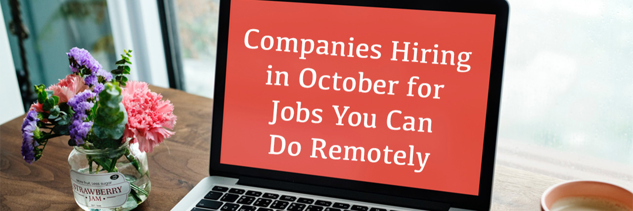 Open computer on desk with article title, available remote jobs in October, onscreen