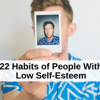 A man holding up a photograph of himself. Text reads: 22 Habits of People With Low Self-Esteem