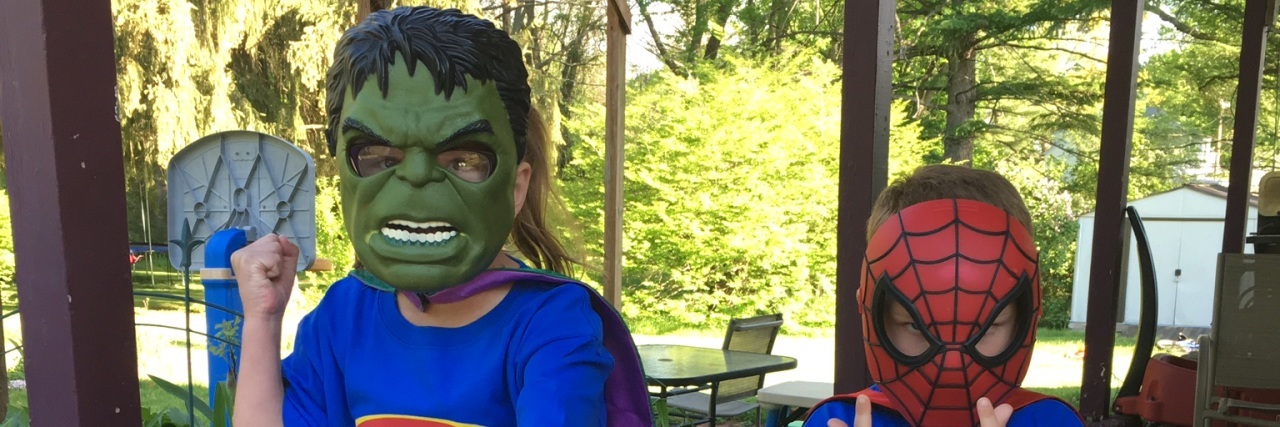Parenting a Child With Tuberous Sclerosis Complex and Finding Support The author's two sons in superhero costumes and masks