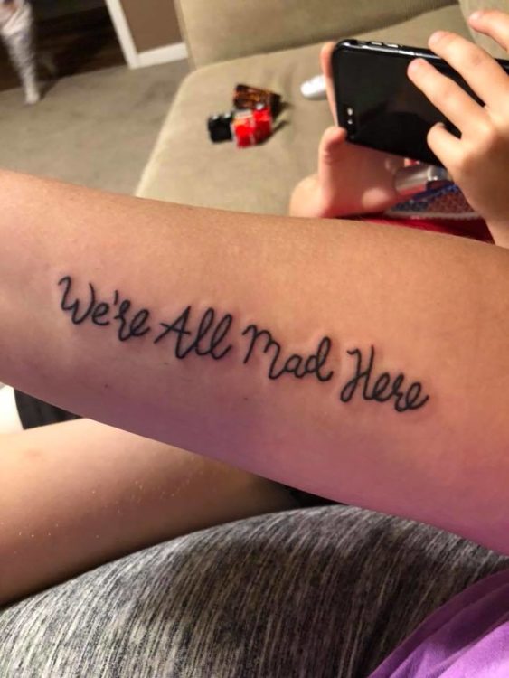 were all mad here  tattoo by fomaink