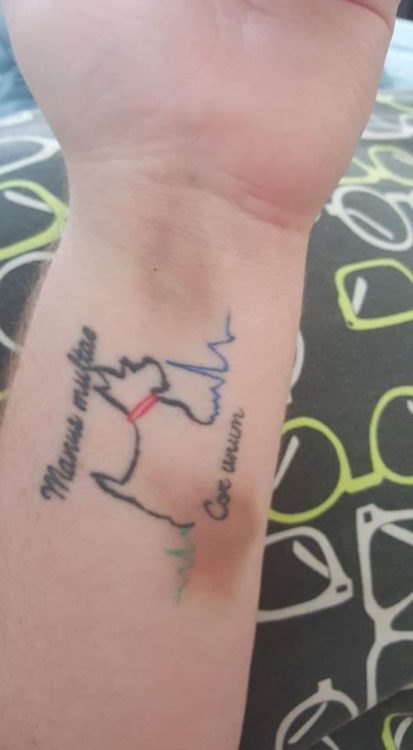 tattoo of dog with heart beat sign and words