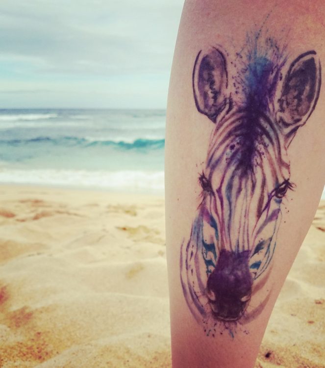 zebra tattoo on leg