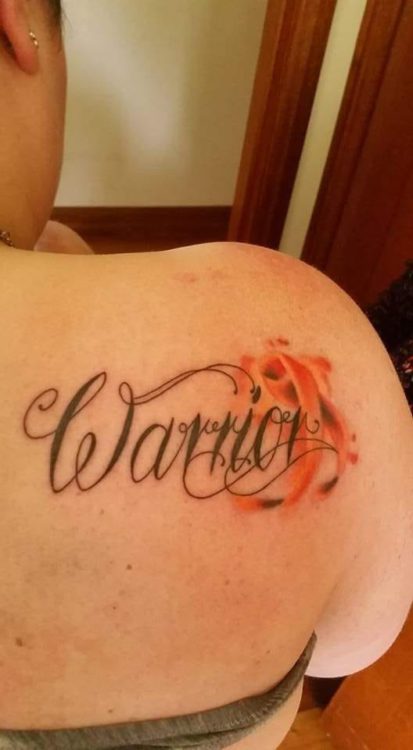 warrior in large script with orange awareness ribbon