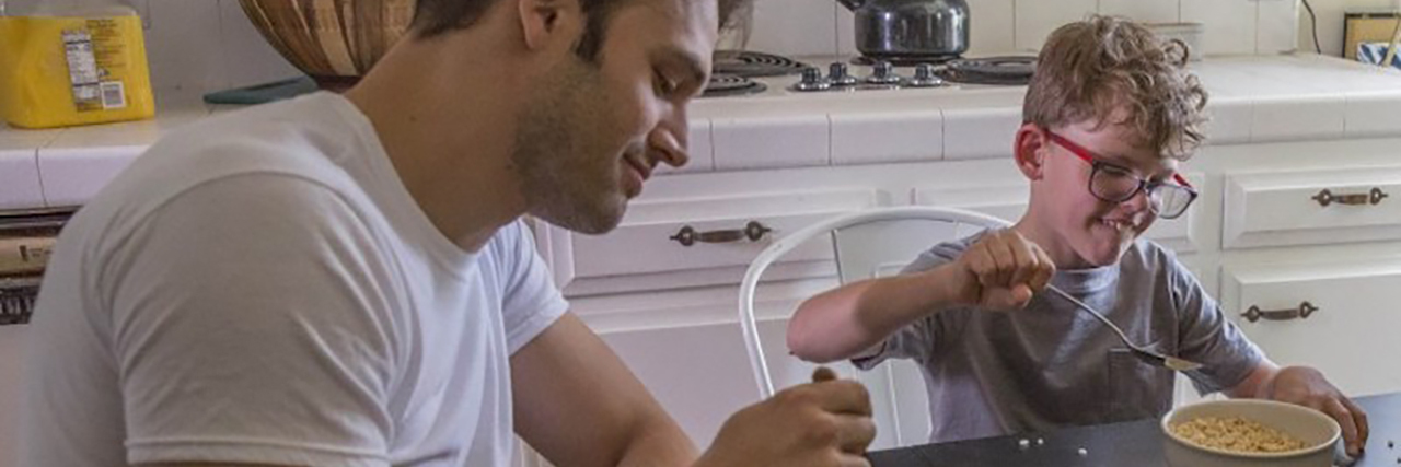 Ryan Guzman and Gavin McHugh eating cereal in their pajamas.