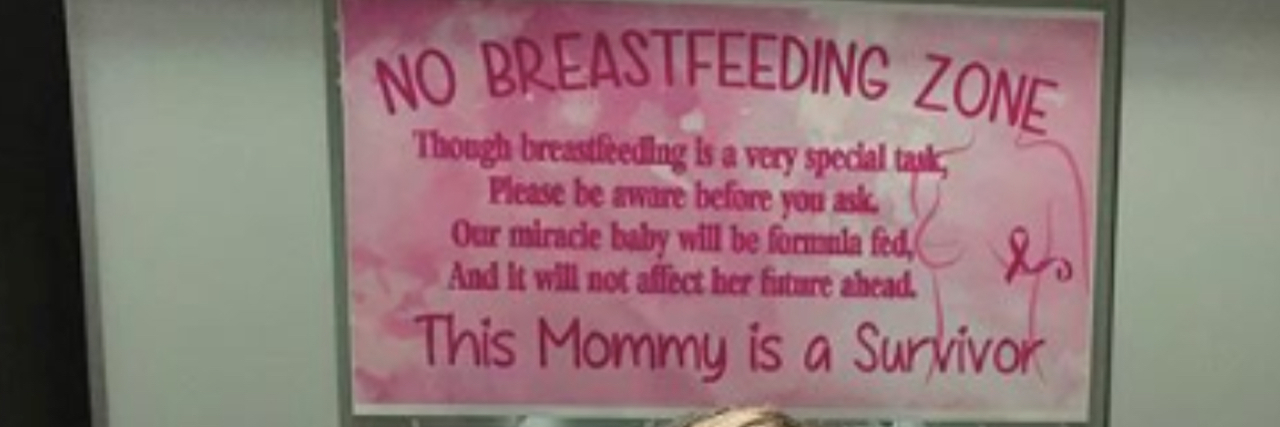 Cancer Survivor Makes Sign to Tell Hospital Staff She Can't Breastfeed Pink sign that explains the