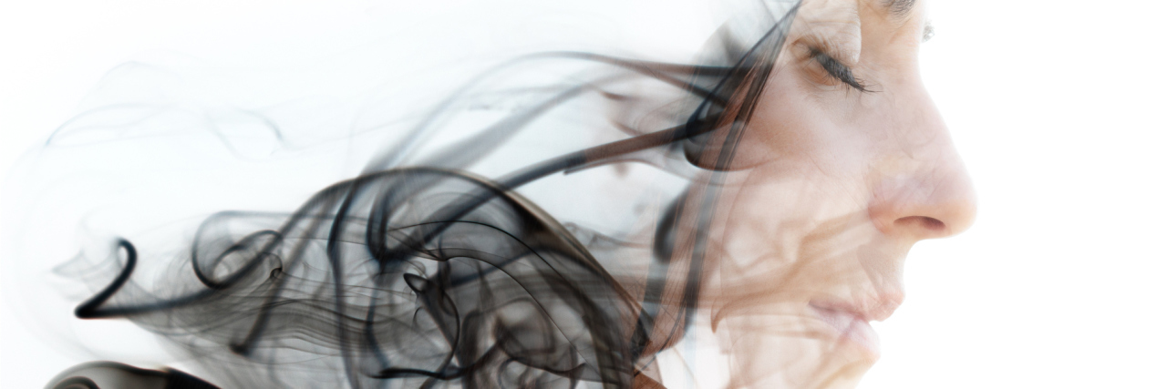Why It's Hard to Ask for Help When You Have Rheumatoid Arthritis Double exposure photograph of a young woman combined with an image of the smoke