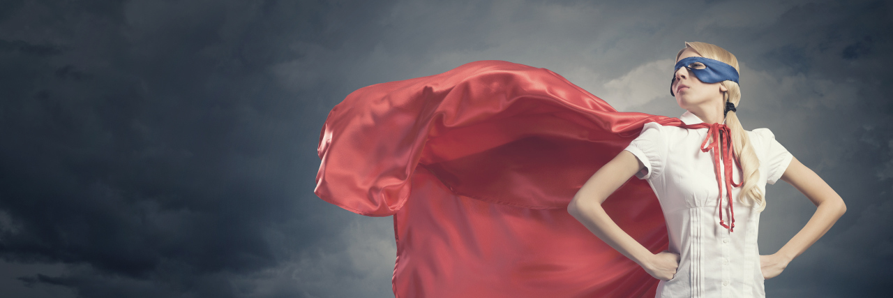 Having a Disability Doesn't Mean I'm Brave Super woman in cape and mask.