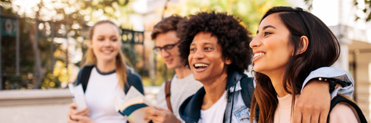 Attending College With Ehlers-Danlos Syndrome College students walking together outdoors.